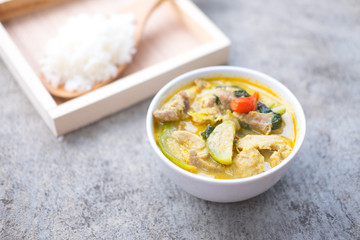 Thai green curry in white bowl