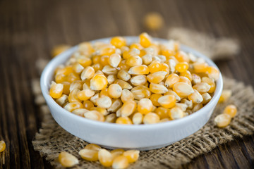 Wooden table with a portion of Corn