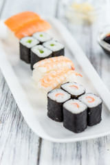 Sushi on a wooden table (selective focus)