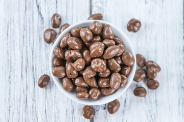 Old wooden table with Chocolate Raisins