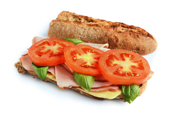 Sandwich with ham, tomato, cheese and basil