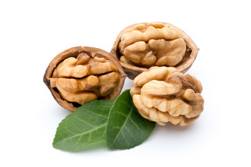 Walnut and walnut kernel isolated on the white background.