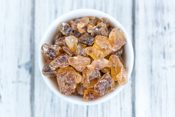 Wooden table with brown Rock Candy