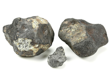 fragments of the Chelyabinsk meteorite (fallen 15 February 2013) isolated on white background © Björn Wylezich