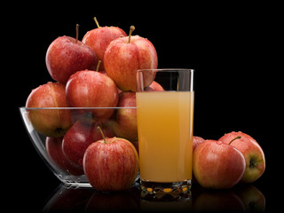 Ripe apples and juice with pulp