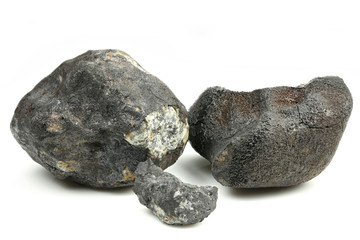 fragments of the Chelyabinsk meteorite (fallen 15 February 2013) isolated on white background © Björn Wylezich