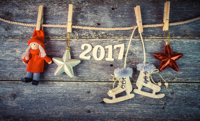 Christmas decoration on abstract background,vintage filter, instagram colors toning. Xmas card and gift. Winter holidays theme.