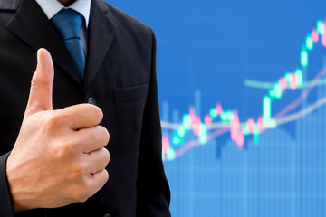 Businessman raising his thumb up