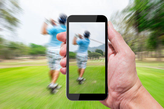 One using smartphone in golf course