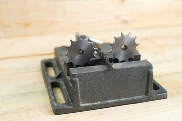 The vise to clamp on a wooden desktop environment tools