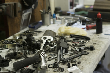 Heap of tools on work table