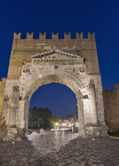 Fototapeta na wymiar Arch of Augustus at night in Rimini, Italy