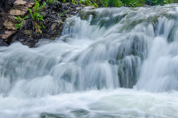 Obraz premium falling water in the morning mist.