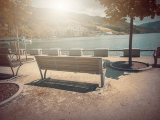  In Autumn. Fantasy fable Bench in Park with Sunrise scene.
