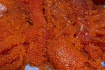 Red caviar close up. The texture of caviar. Sea food. Healthy eating. Diet.