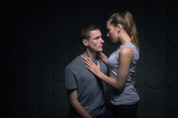 Passionate young couple in the room