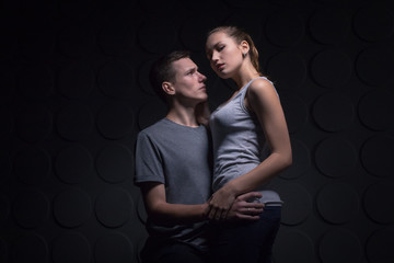 Passionate young couple in the room