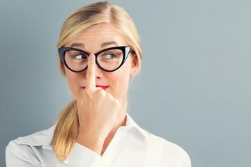 Young businesswoman in black glasses