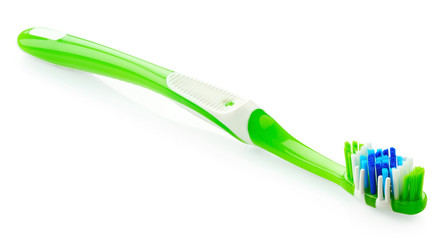Green toothbrush isolated on white background