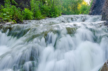 falling water in the morning mist.