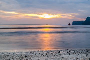 Fototapeta premium Beautiful sunset, shining in the sun sea, Prachuap bay