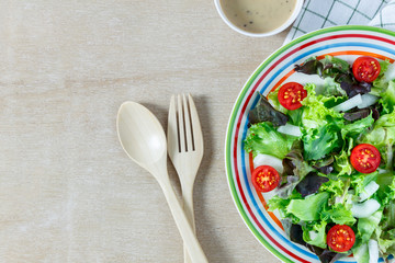 Top view cooking salad  on wood table with copy space.