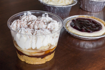 Sweet cupcake on wood background