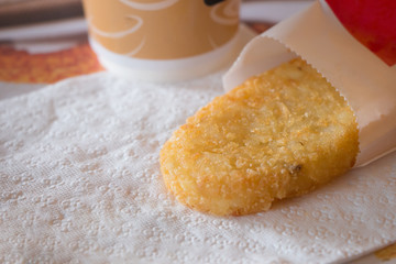 Hash brown and hot coffee for breakfast image