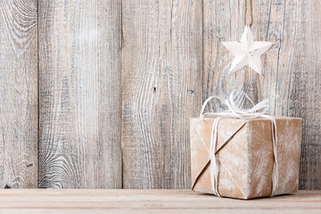 Christmas or New Year background with gift box and star