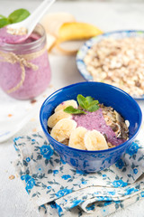 Healthy breakfast. Organic muesli with natural yogurt and bilberry
