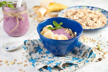 Healthy breakfast. Organic muesli with natural yogurt and bilberry
