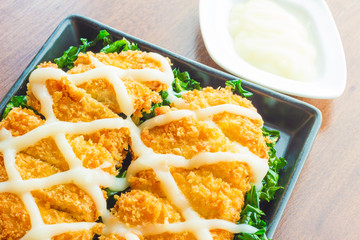 breaded fish fingers with mayonnaise