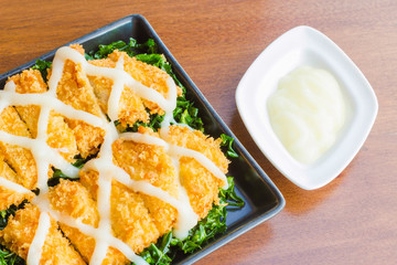 breaded fish fingers with mayonnaise