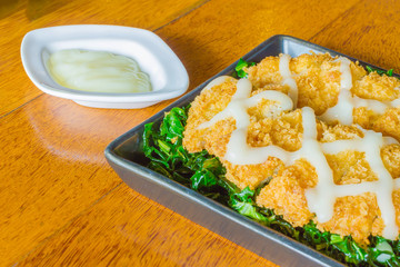breaded fish fingers with mayonnaise