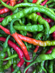 colorful hot peppers as a background