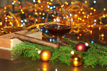 christmas photo cognac glass in front of bokeh background