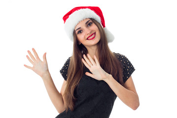 happy brunette girl in santa hat