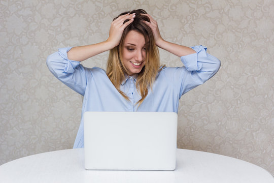 Girl shocked and surprised look in laptop