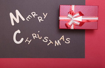 Fototapeta na wymiar Merry Christmas. greeting card and gift box. Xmas background.
