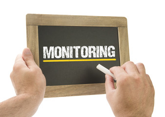 Monitoring / Hand writing on chalkboard