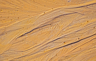 Golden sand dune on the beach, texture background