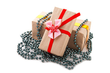 Boxes with gifts and beads on the isolated background
