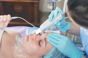 Ultrasonic cleaning of the face rejuvenation