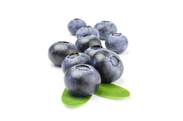 Some fresh blueberries one after the other isolated on white