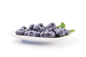 Blueberry in a bowl isolated on white