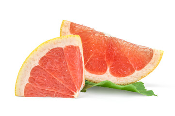Slices of grapefruit on a white background