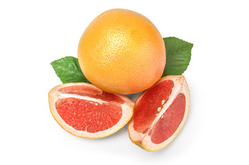 Whole grapefruit and two wedges on white with green leaf