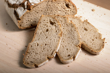 slices of rye bread on wooden cutting board