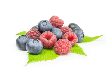 Blueberry and raspberries on white background
