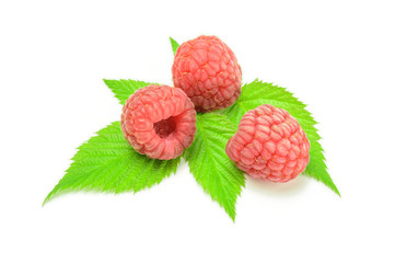 Ripe raspberries with green leaf